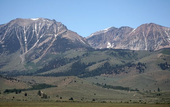 Snow spotted mountain range in the high sierras of California