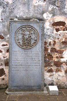 An ancient 17th century Dutch tombstone found at the ruins of St. Paul's Church, originally built by the Portuguese in 1521 at the UNESCO World Heritage site of Malacca, Malaysia.