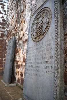 Ancient 17th century Dutch tombstones found at the ruins of St. Paul's Church, originally built by the Portuguese in 1521 at the UNESCO World Heritage site of Malacca, Malaysia.