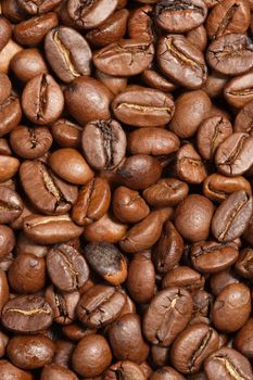 Background image of roasted coffee beans.