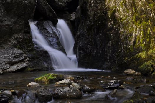 waterfalls in a mountain brook