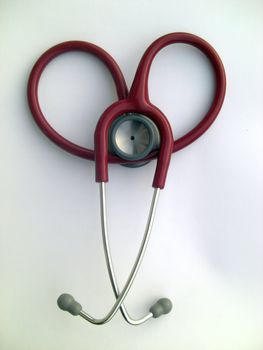 medical device for ausculation, symbol for love at the workplace, upright format