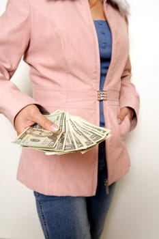 A woman holding money