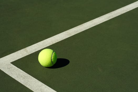 A tennis ball in a tennis court