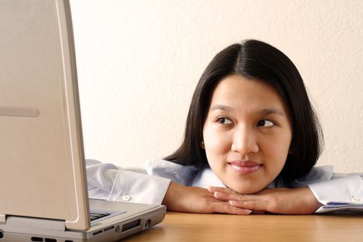 A businesswoman working at her office