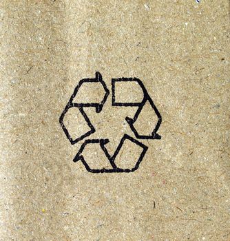 Brown corrugated cardboard with recycle symbol