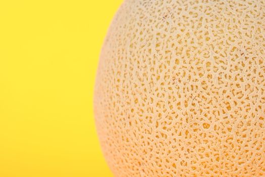 Cantaloupe with yellow background