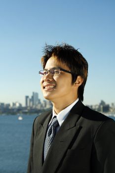 A happy businessman outdoor at a park