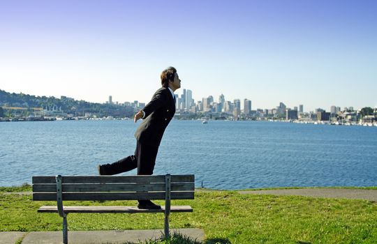 Businessman relaxing outdoor at a park