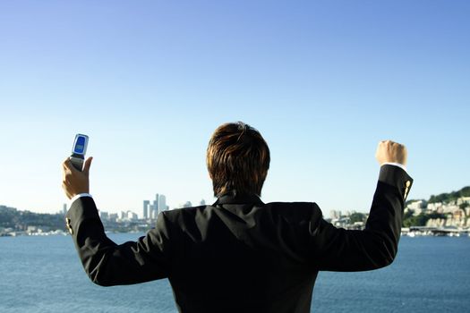 A happy businessman after receiving a good news