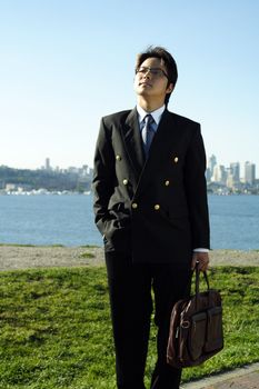 Businessman walking at a park