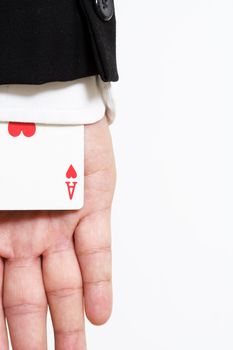 A businessman carrying an ace of hearts