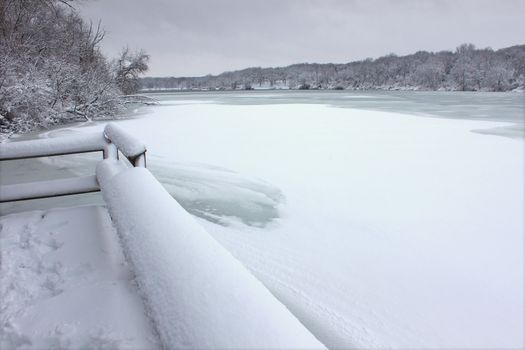 Freshly fallen snow on Pierce Lake at Rock Cut State Park - Illinois.