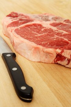 Ribeye steak being prepared for cooking