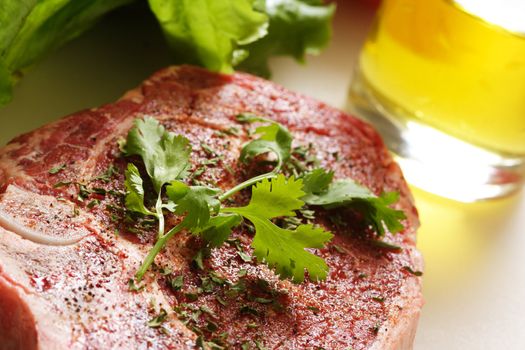 Seasoned ribeye steak ready for grill