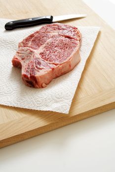 Preparing ribeye steak for cooking