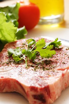 Seasoned ribeye steak ready for cooking