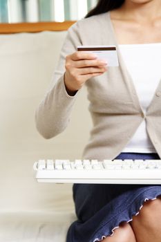 A businesswoman making an online purchase