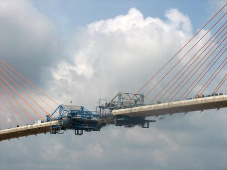 Bridge over the Mekong Delta in the Gulf. The Vietnam seriously lacks communication with the innumerable problems due to cross water. Many countries participate in the construction of bridges.