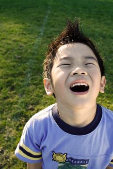 A happy kid playing outdoor