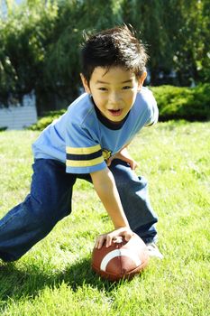 A boy having fun playing football