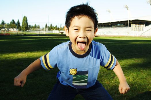 A happy boy with funny expression