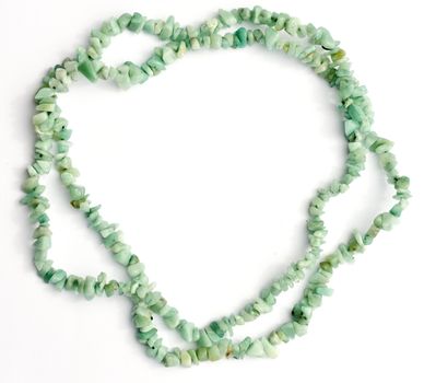 Amazonite gemstone chip bead necklace on white background with natural shadows