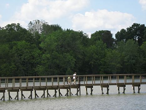 A photograph of a pier near a waterway.