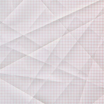 folded and creased white graph paper with red grid