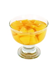Orange peach compote in glass isolated on white