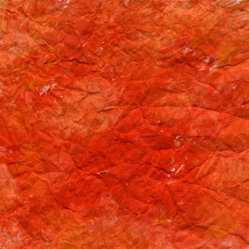 rough texture of white paper painted with red, yellow watercolors and crumpled