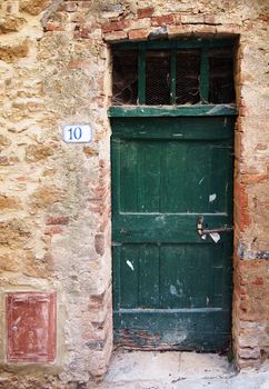 Ancient entrance in an old Tuscan town.