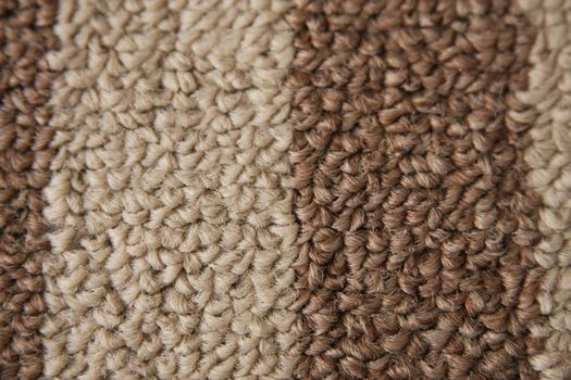 A close up of berber carpet as a background.
