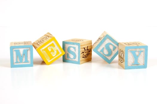Childrens colorful blocks spell messy