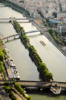 tour boat navigating the Seine river