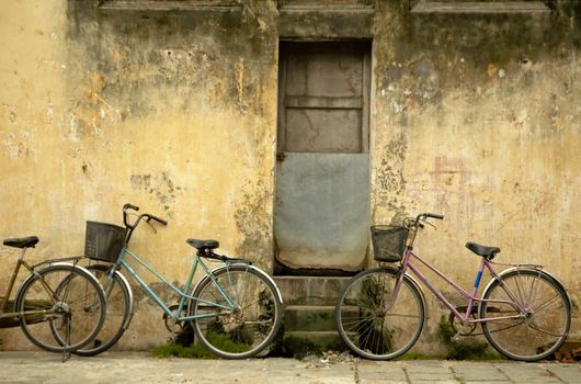 Parked bikes at at street of Hoi An