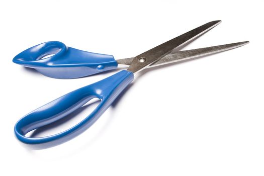 Blue metal scissors over white background