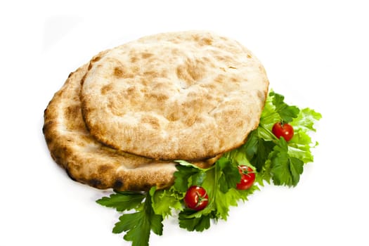 Two pita bread on a white background.