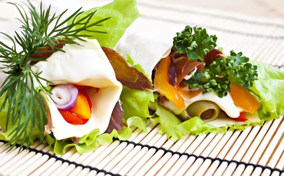 Lavash with fresh vegetables, cheeses and dried meats.
