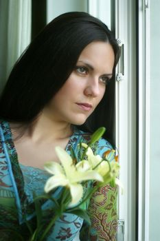 The girl looking out of the window