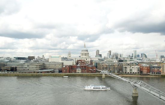 Wide angle view of Saint Paul's Cathedral in the City of London, UK under a typica British rainy weather
