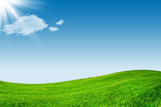 Abstract background of blue sky and green graaland