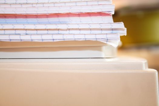 pile of books and educational equipment closeup