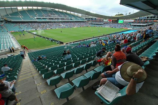 sydney soccer stadium during a game, spectators