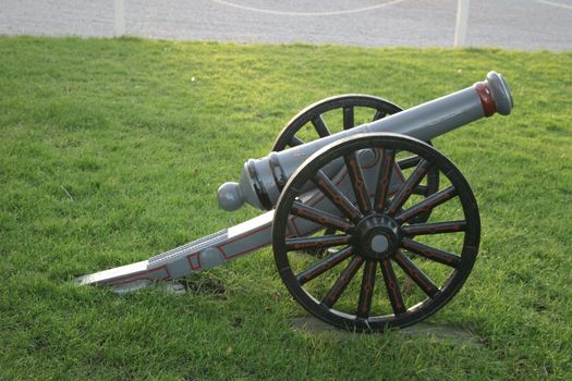 old restored canon outside on the grass