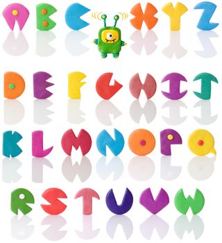 Colorful and funny plasticine letters with real reflections. Good for halloween usage. Plasticine monster with one eye. Isolated over white