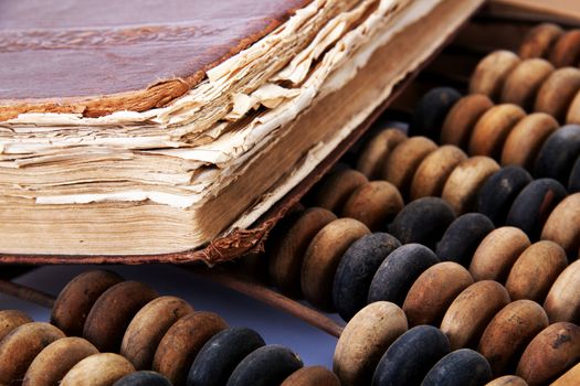 Image of an old book lying on the accounts, close-up
