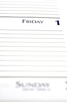 Personal planner opened to Friday the 1st.