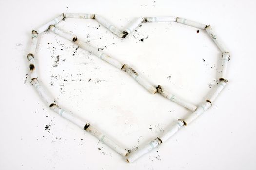 Cigaretts form a heart with a line through it.