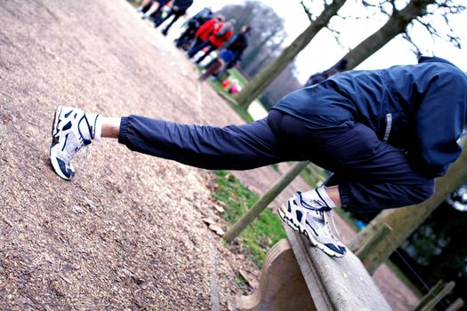 Sportsman making stretchings after sports activity, to avoid the cramps